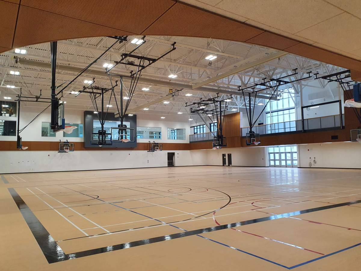 The main gymnasium at Dr. Anne Anderson School, a new high school in southwest Edmonton’s Heritage Valley area.