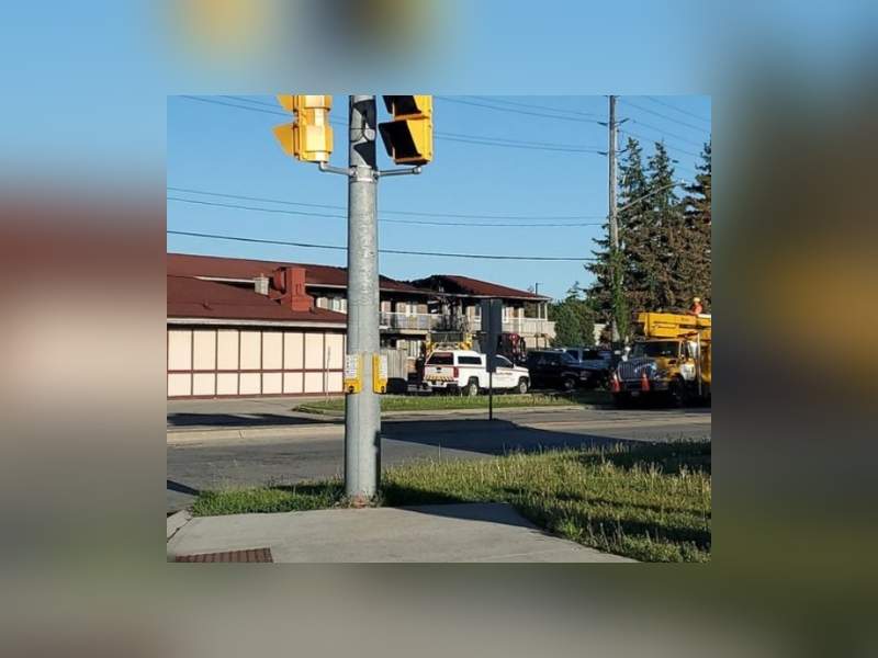 A large burnt-out hole could be seen on the roof of the Super 8 motel in Guelph.