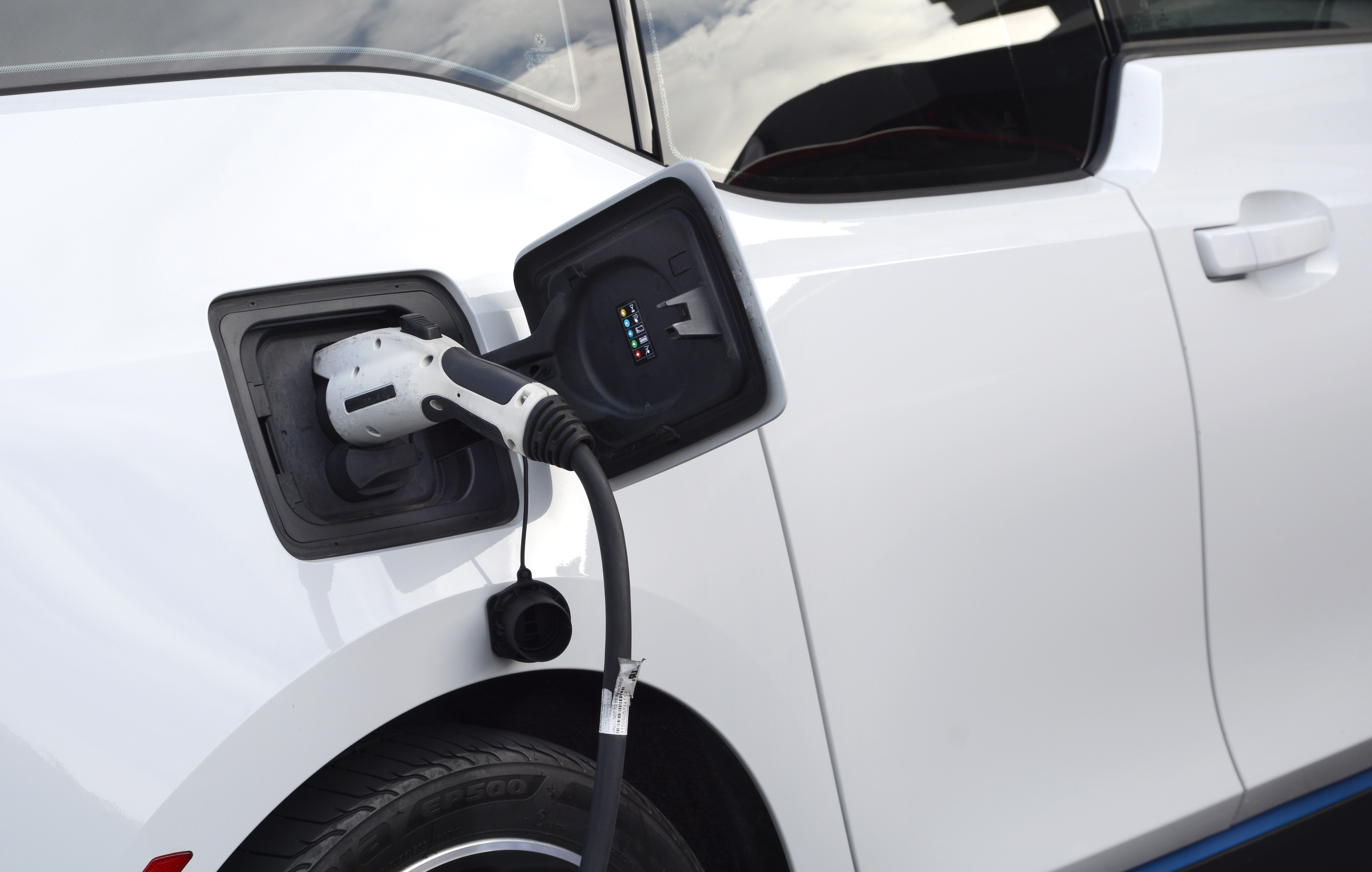 An electric BMW gets its batteries charged up. 