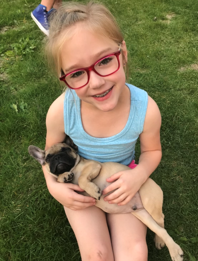 Ashley Anderson’s dog and child.