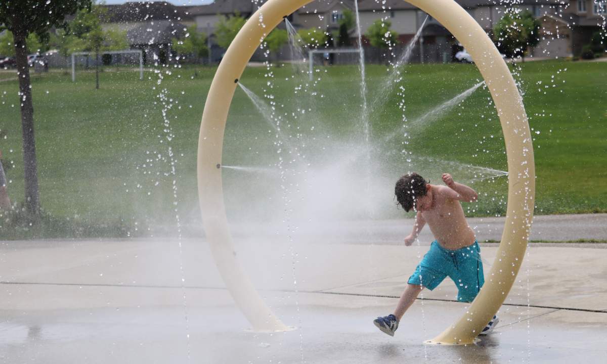 Noah Cooper, five, was out enjoying the reopening of splash pads in London Saturday May 22, 2021