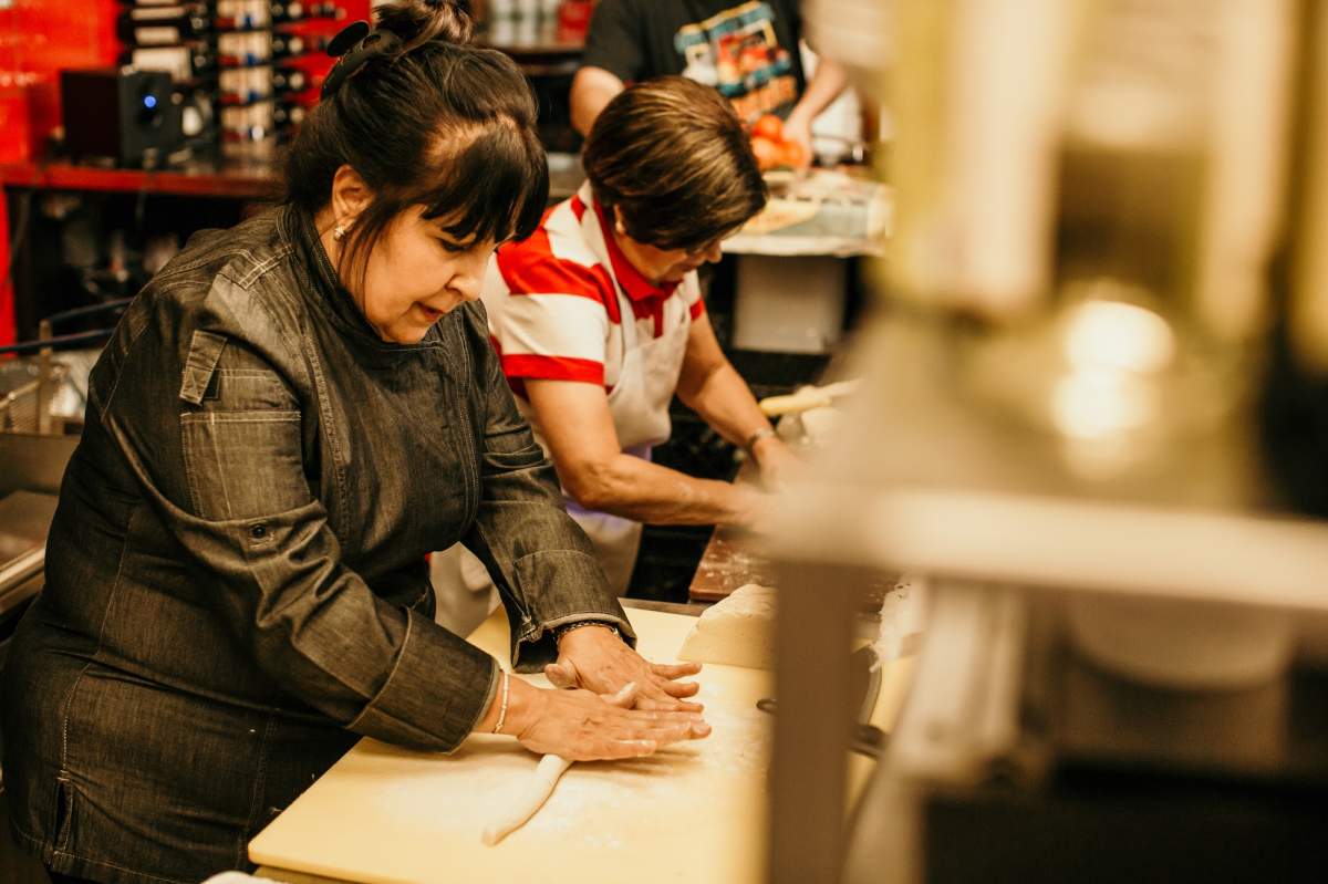 Julia Hanna (left), owner of ‘Ritorno’ restaurant, has been in business for 38 years. She credits her mother, ‘Nonna’ (right) for the special values she passed down to her.