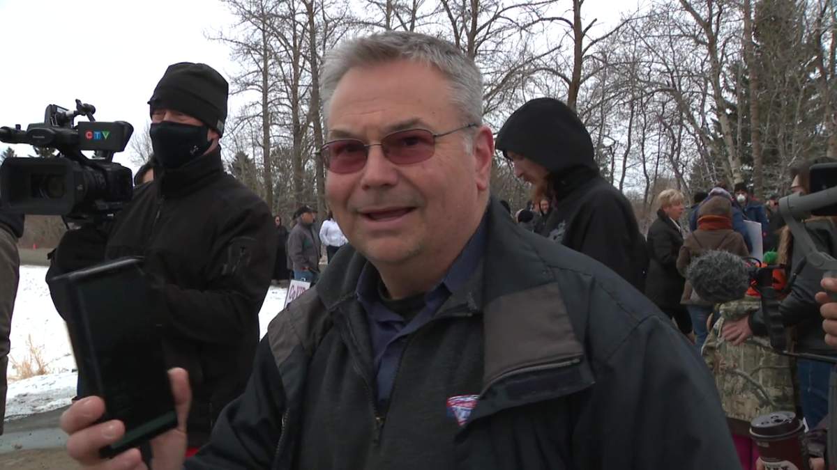 Kevin Johnston attending a rally outside GraceLife Church on April 11, 2021.
