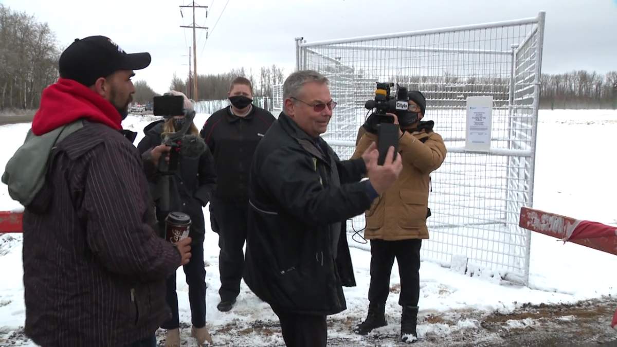 Kevin Johnston attending a rally outside GraceLife Church in Parkland County, near Edmonton, on April 11, 2021.