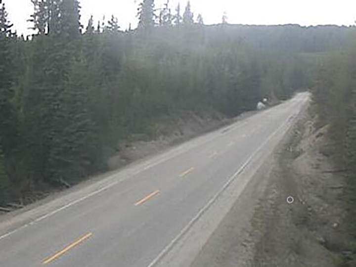 Road conditions along Paulson Summit on Wednesday morning, May 19, 2021. Environment Canada is calling for periods of snow for elevations above 1,400 metres, starting Wednesday evening through to midday Thursday.