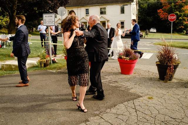 The wedding was small — separated by yellow caution tape and flowers. Union Eleven Photographers