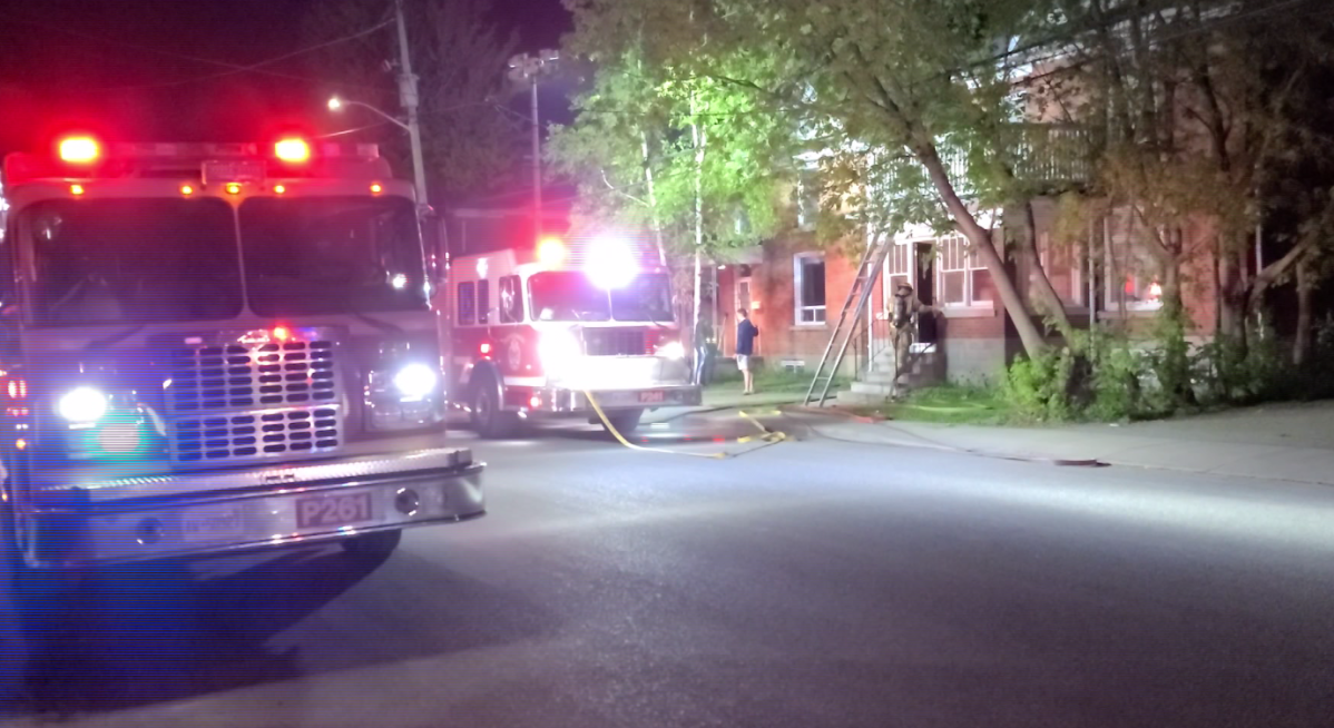 Some residents of a building that caught fire in downtown Kingston needed to be rescued by ladder Tuesday morning, Kingston Fire and Rescue says.