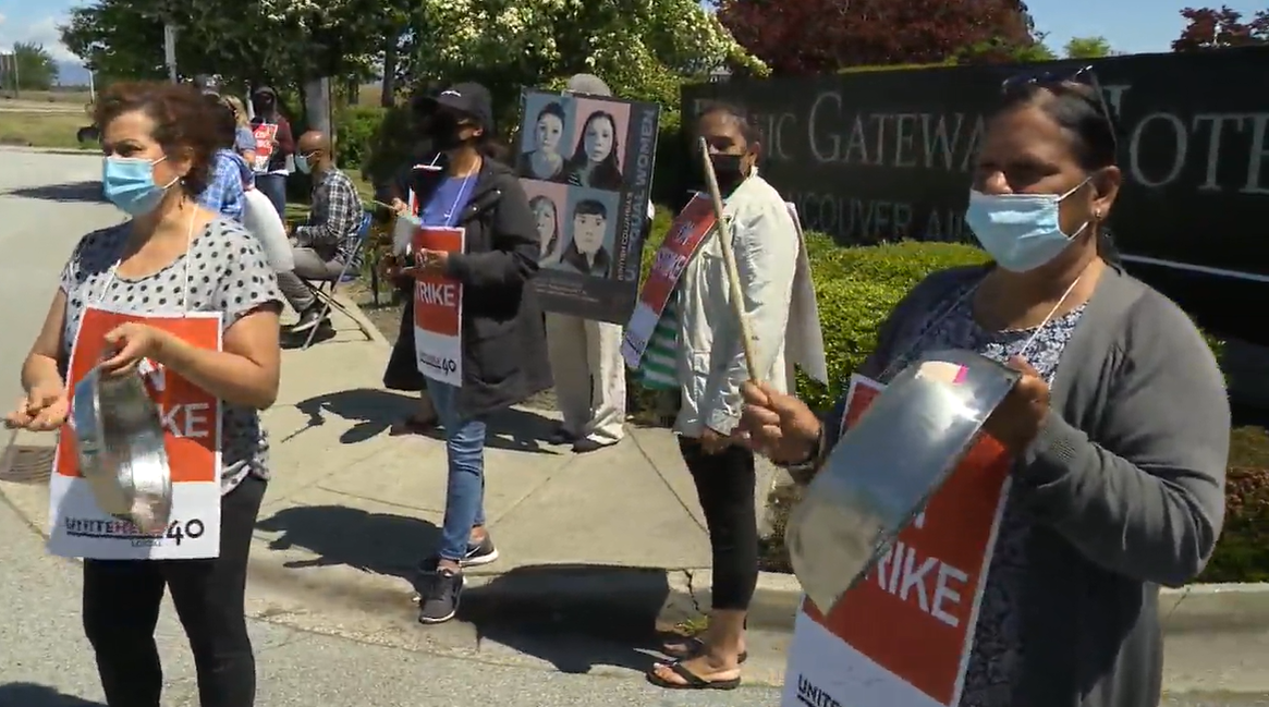 Unionized B.C. hotel workers on strike in 2021. 