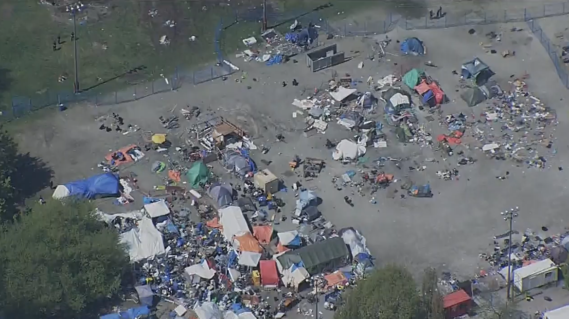 An aerial view of Strathcona Park on Sunday as crews worked to remove structures left over from a controversial homeless camp. 