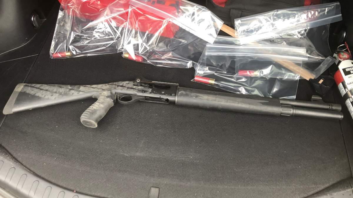 A semi-automatic shotgun and shotgun shells were recovered.
