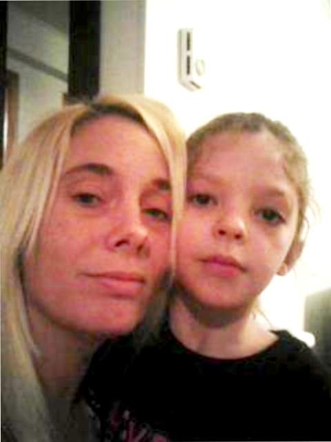 An image from Christmastime 2012 shows Linda Boudreau with her niece, Madison Roy-Boudreau