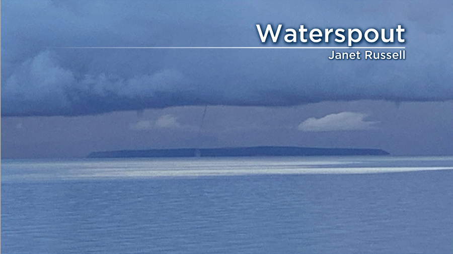 A waterspout and potentially two funnels clouds spotted over the Strait of Georgia on Thursday morning.