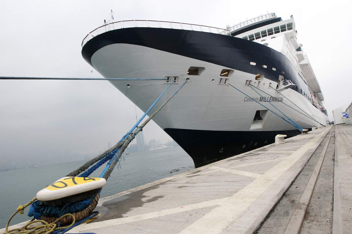 Celebrity Millennium cruise ship docks at Kai Tak cruise terminal in Kowloon Bay.