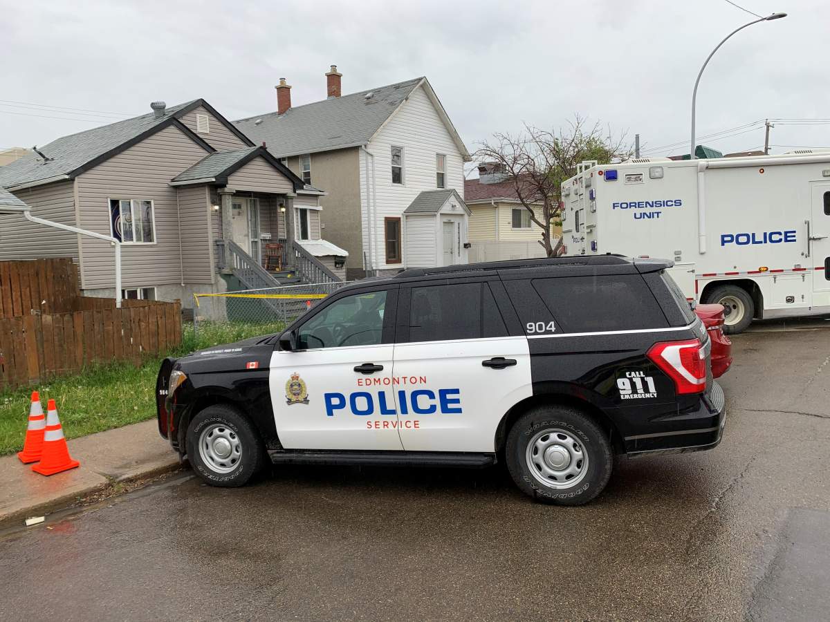 Edmonton police investigate a suspicious death after a man was found injured at a home in the area of 98 Street and 108 Avenue and later died in hospital, Wednesday, June 9, 2021. 