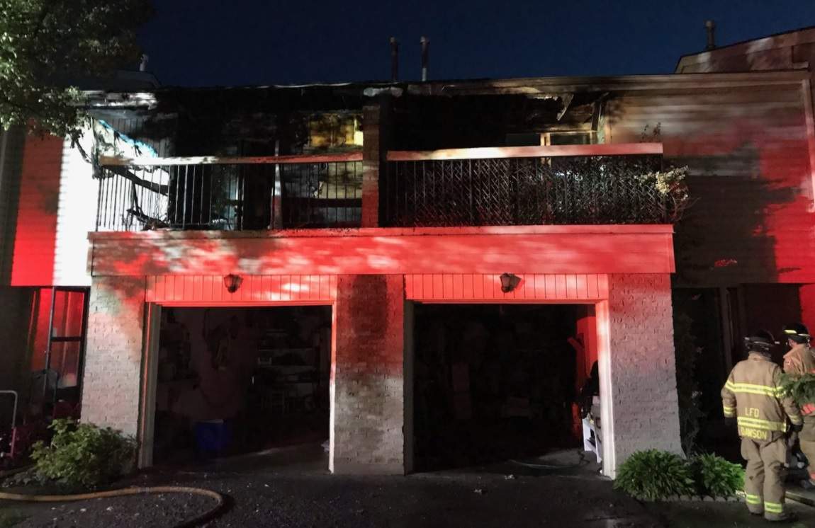 London fire fighters responding to a fire at a townhouse complex in south London Tuesday morning.
