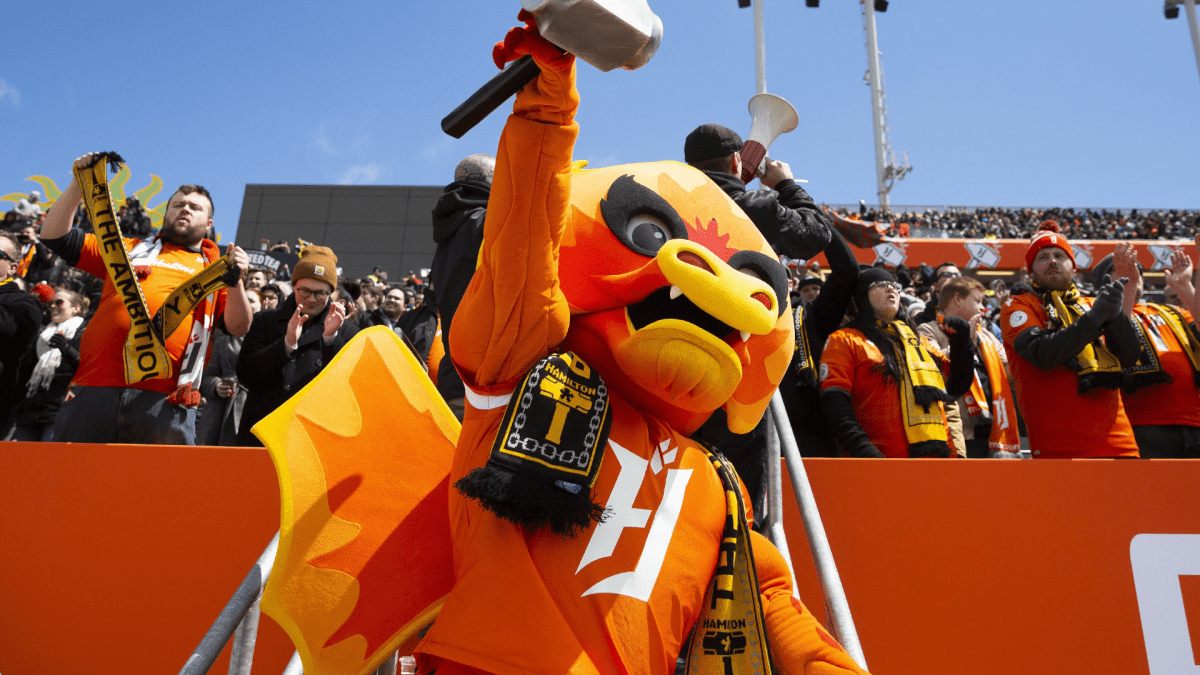 Forge FC mascot, Sparx, cheers with Forge fans during the inaugural soccer match of the Canadian Premier League between Forge FC of Hamilton and York 9 in Hamilton, Ont. Saturday, April 27, 2019.