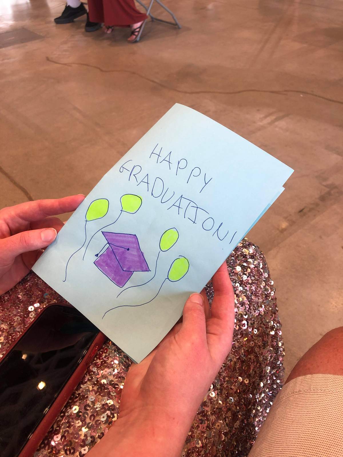 Staff at the vaccine clinic all signed the card.