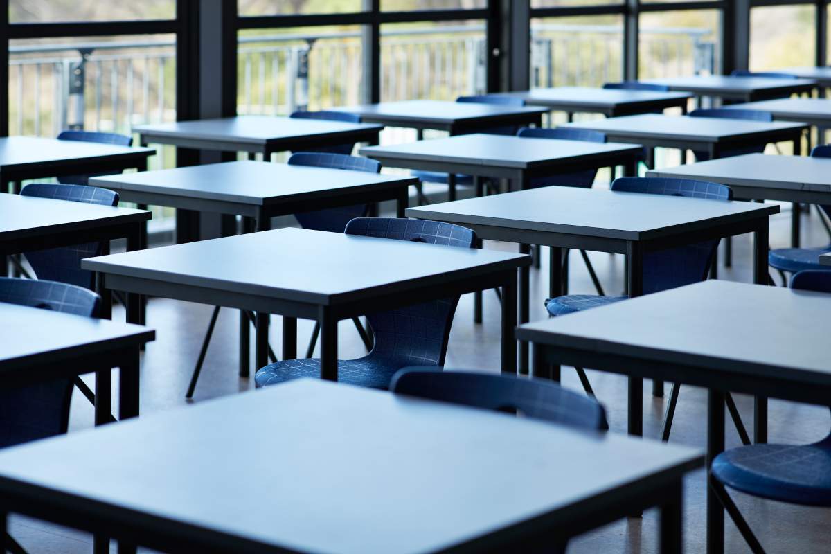 File photo. Empty classroom with desks.