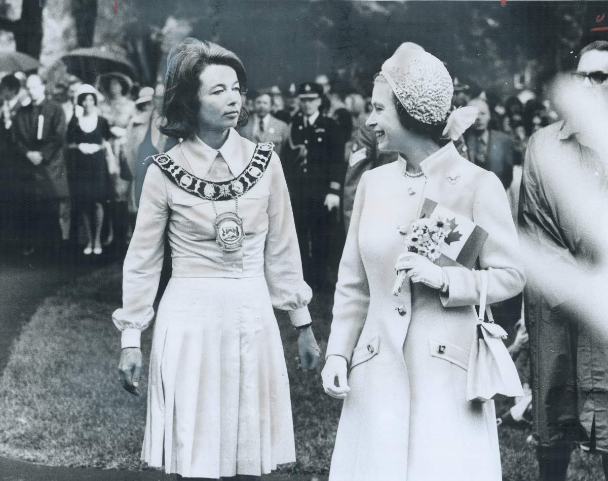 CANADA - London Mayor Jane Bigelow stands beside the Queen in Victoria Park on June 27, 1973.