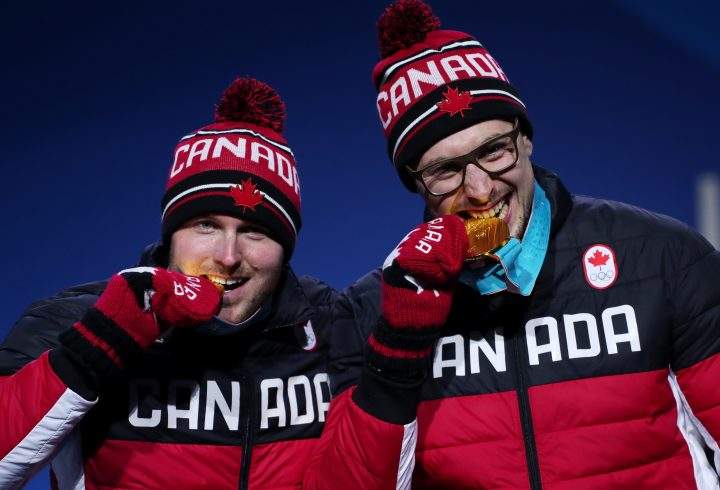 Gold medalists Alexander Kopacz and Justin Kripps of Canada celebrate during the medal ceremony for Bobsleigh – 2-man on day 11 of the 2018 Winter Olympic Games on February 20, 2018 in Pyeongchang, South Korea.