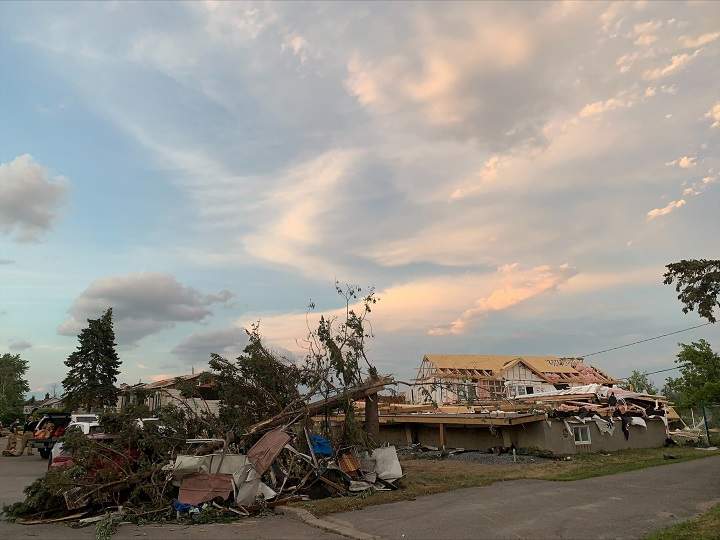 The aftermath of a tornado in Masouche, Monday, June 21, 2021.