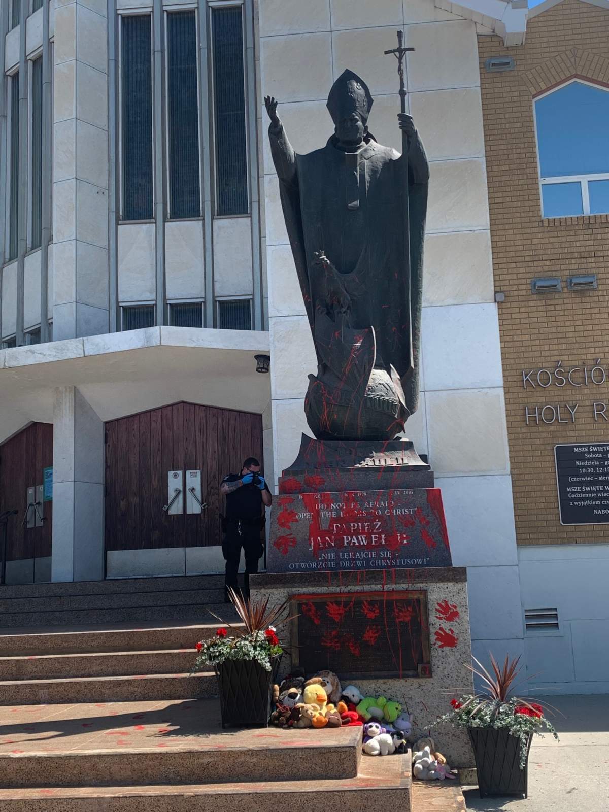 A statue of Pope John Paul II outside the Holy Rosary Catholic Church at 11485 106 St. was vandalized with red paint on Saturday, June 26, 2021.