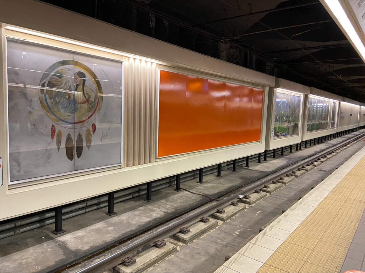 The mural depicting Bishop Vital-Justin Grandin at an Edmonton LRT Station was covered in orange Tuesday, June 8, 2021.