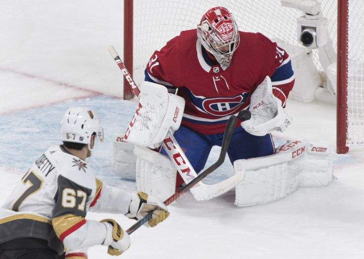 Vegas Golden Knights’ Max Pacioretty takes a shot on Montreal Canadiens goaltender Carey Price during first period NHL hockey action in Montreal, Saturday, Jan. 18, 2020.
