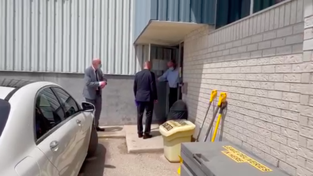 London Police Service officers entering Gray Ridge Eggs Farm on Tuesday. The suspect accused of killing a Muslim family with a pickup truck worked at the plant in Strathroy, Ont.