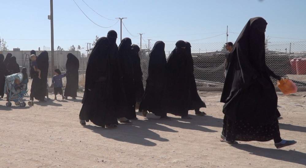 Canadian woman released from ISIS camp cooperating with police, former ambassador says - image