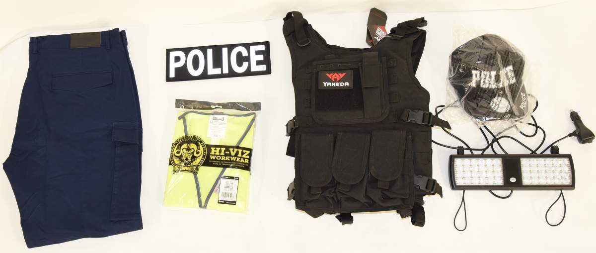 Items resembling police clothing and equipment Manitoba RCMP allegedly recovered from Eric Wildman’s vehicle on June 13, 2021.
