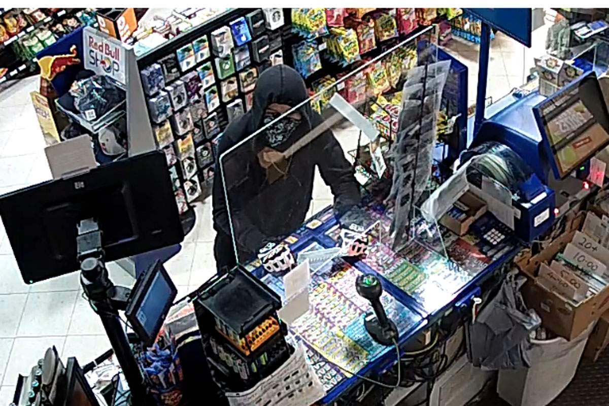 Waterloo Regional Police say they are looking to speak with this man in connection to a robbery in Cambridge.