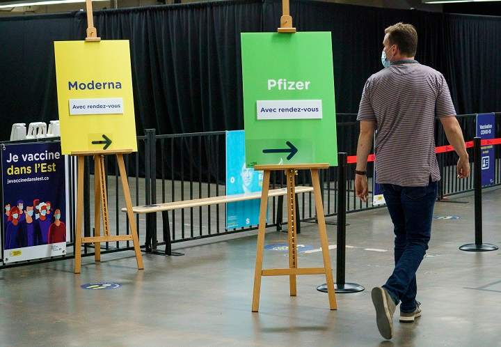 A man arrives at a COVID-19 vaccination clinic in Montreal, on Monday, June 21, 2021. 
