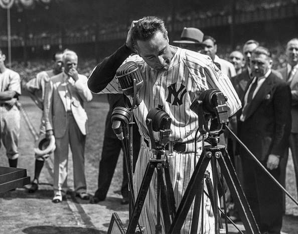 NEW YORK, NY – JULY 4: Lou Gehrig #4 of the New York Yankees is shown before the mic delivering his farewell speech on Lou Gehrig Day on July 4, 1939 at Yankee Stadium in the Bronx, New York.