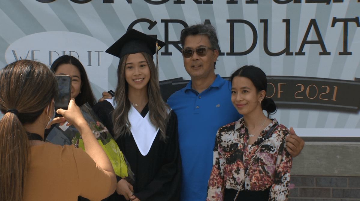 Isabella Pepito and her family pose for a photo following the graduation ceremony at Maples Collegiate.