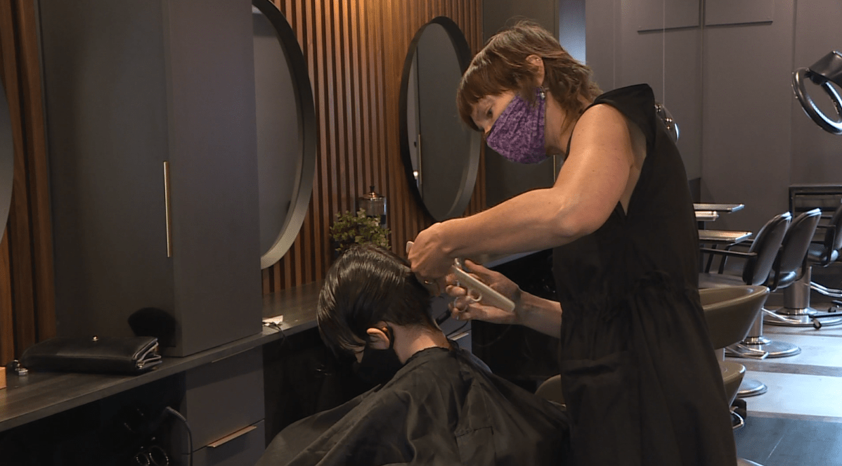 A haircut being given on Saturday at Angles Hair Salon on Lilac.