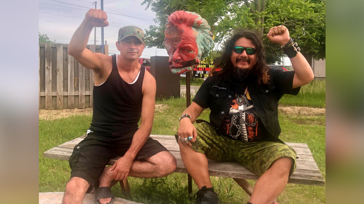 1492 Land Back Lane land defender Skyler Williams seen in a Facebook post with the head from the Egerton Ryerson statue that was toppled at the university that bears his name in Toronto on June 6, 2021.