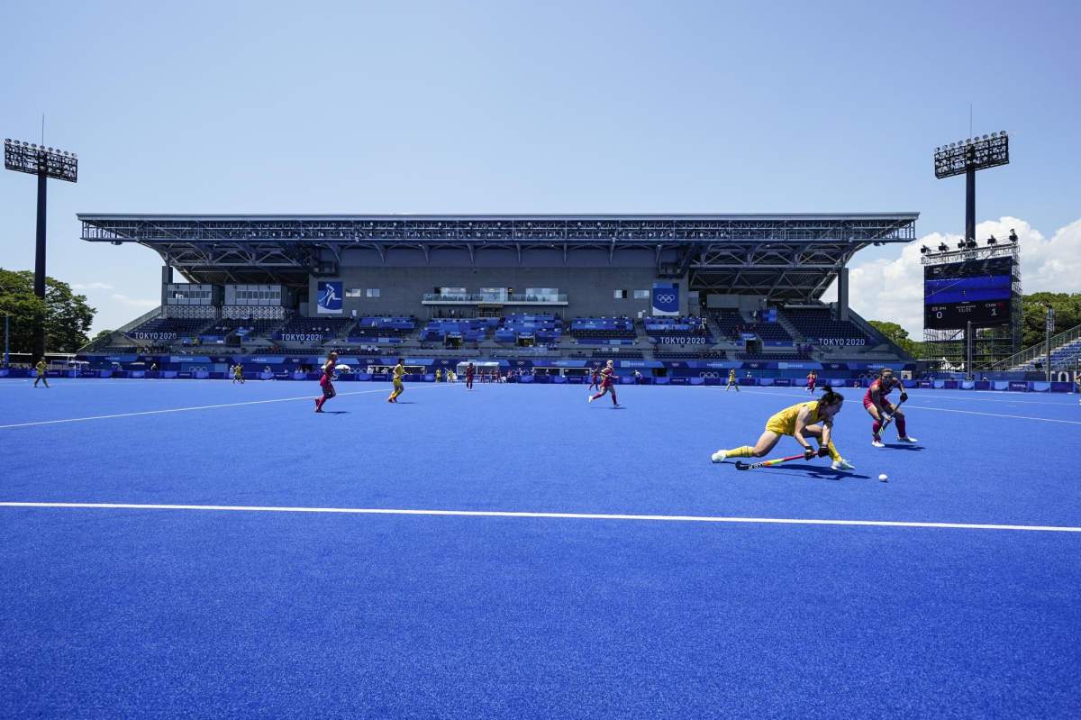 Stands remain empty of fans due to COVID-19 restrictions on the north pitch of the Oi Hockey Stadium during a women’s field hockey match between China and Japan at the 2020 Summer Olympics, July 25, 2021, in Tokyo, Japan.