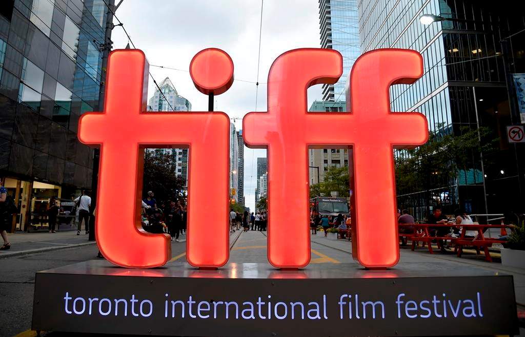FILE - In this Thursday, Sept. 6, 2018, file photo, a view of a festival sign appears on Day 1 of the Toronto International Film Festival in Toronto. 