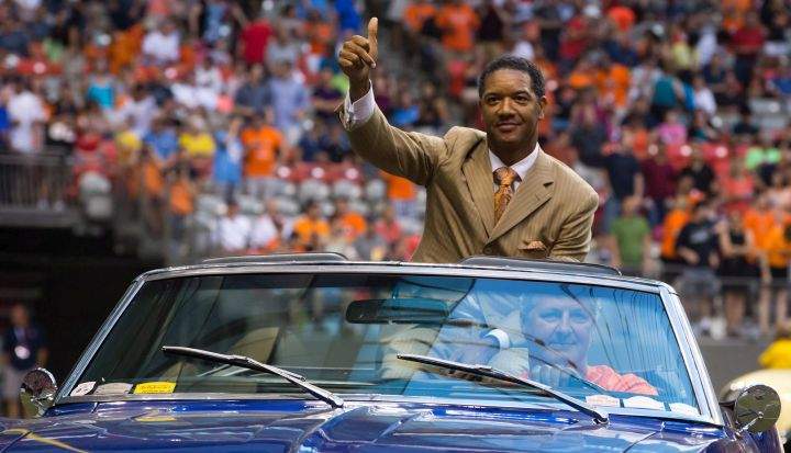 Former Edmonton and B.C. quarterback Damon Allen is driven onto the field to be inducted into the CFL football team’s Wall of Fame in Vancouver, B.C., on Saturday July 20, 2013.