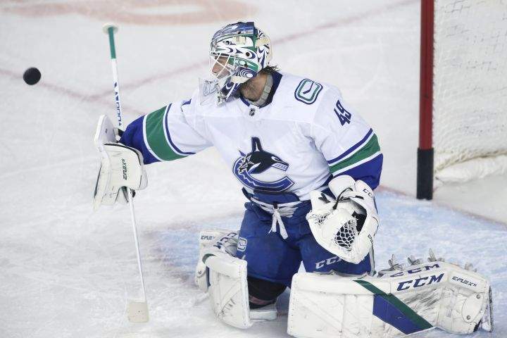 NHL profile photo on Vancouver Canucks goalie Braden Holtby at a game against the Calgary Flames in Calgary, Alta. on May 19, 2021.