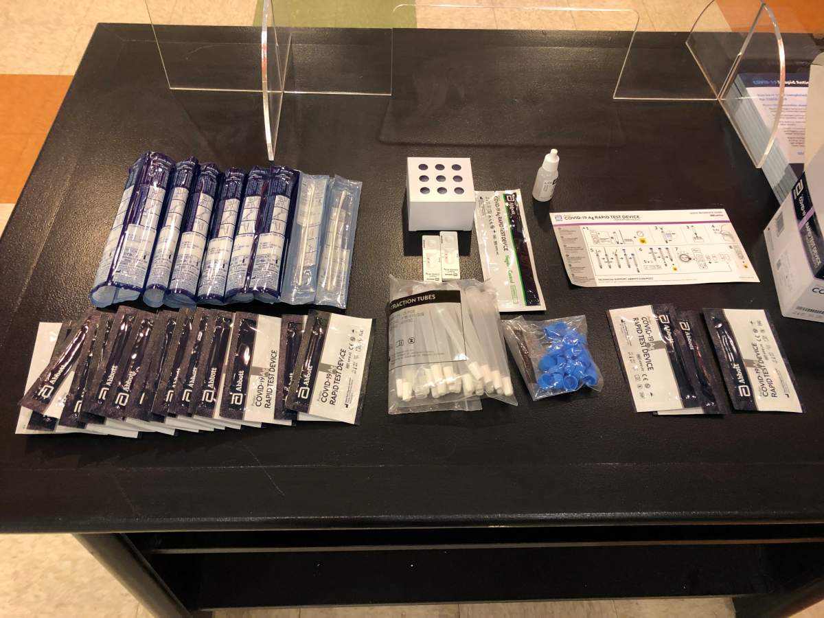A COVID-19 rapid test kit on display at a temporary distribution centre in Saint John, N.B.