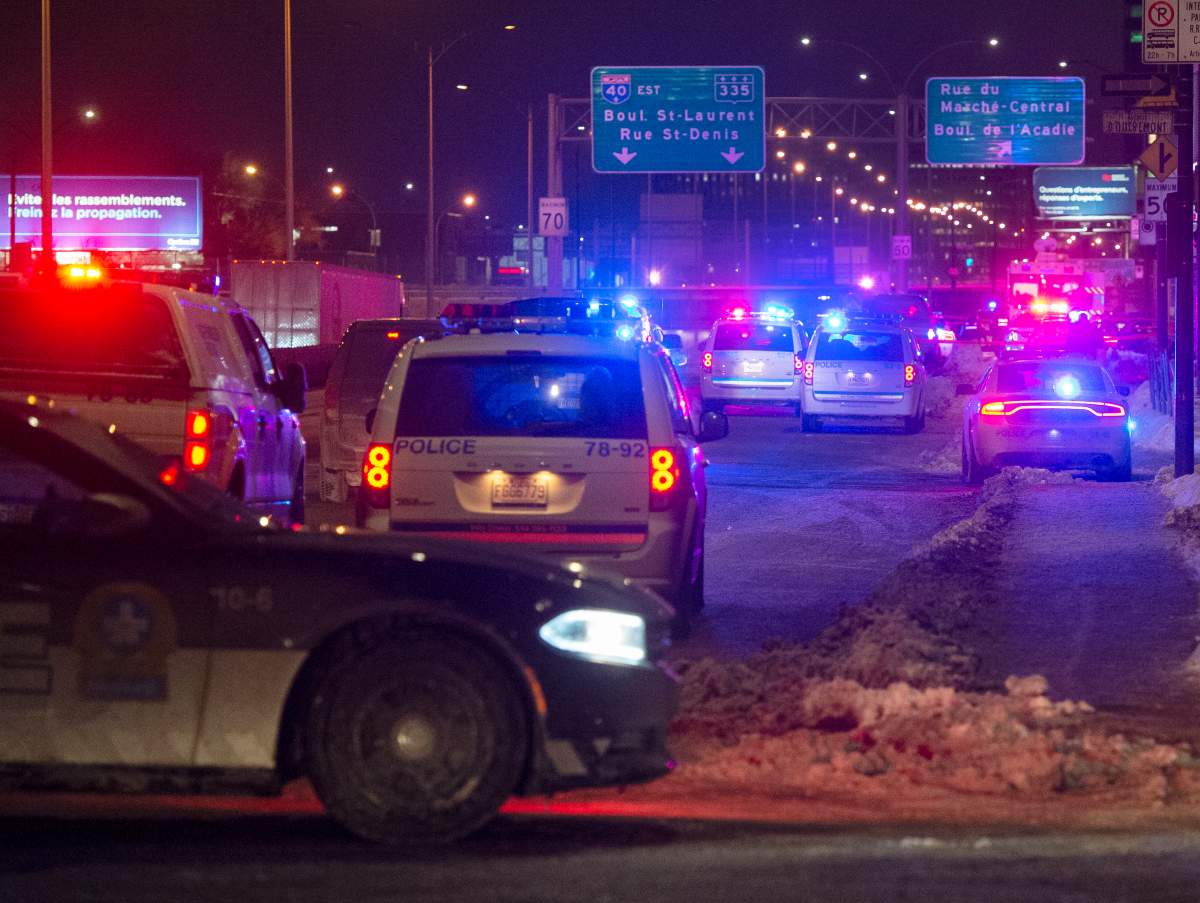 Police cordon off the area where an officer was allegedly attacked on Thursday, January 28, 2021 in Montreal. 