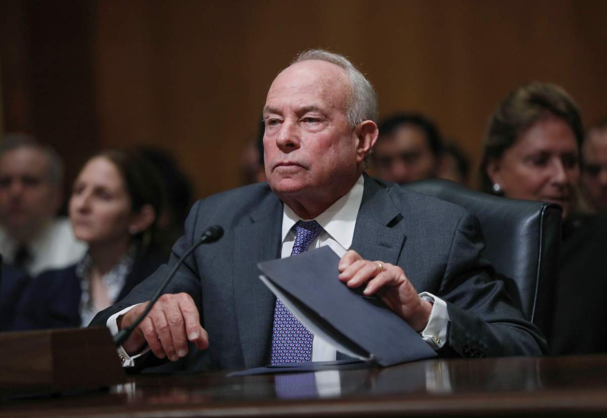 FILE - In this Tuesday, Oct. 2, 2018, file photo, the Senate Finance Committee holds a hearing on the nomination of Andrew Saul to be commissioner of the Social Security Administration, on Capitol Hill in Washington. On Friday, July 9, 2021, President Joe Biden fired Social Security Administration Commissioner Saul after Saul refused to resign, and accepted the deputy commissioner's resignation, the White House said. (AP Photo/J. Scott Applewhite, File).
