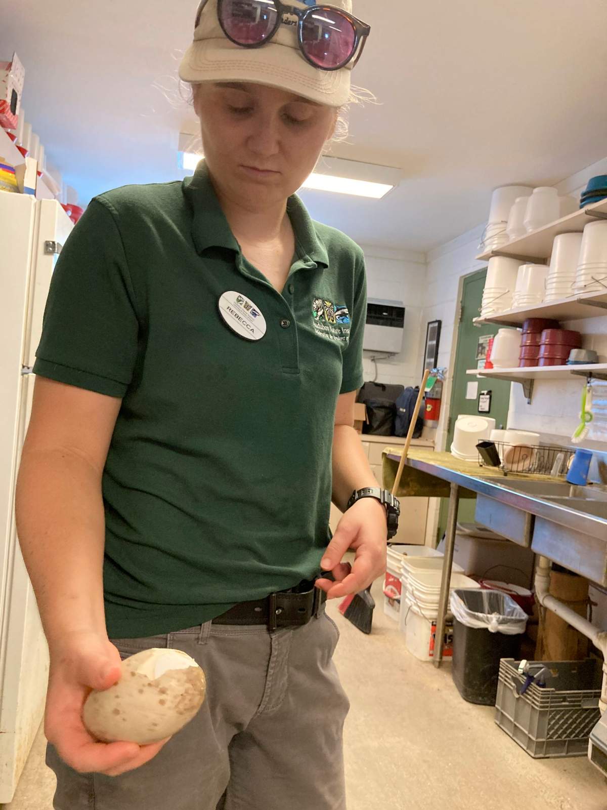 Rebecca Arnold, a bird keeper at Audubon Nature Institute’s Species Survival Center in New Orleans, holds a “dummy egg” for endangered whooping cranes on Tuesday, July 13, 2021.