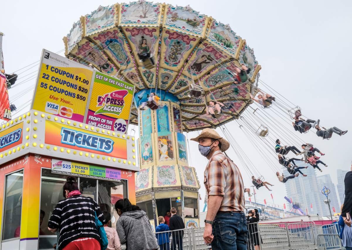 Visitors to the Stampede had to cope with an Air Quality Health Index (AQHI) of 10 with wildfire smoke blowing into Calgary, Alta., Sunday, July 18, 2021.