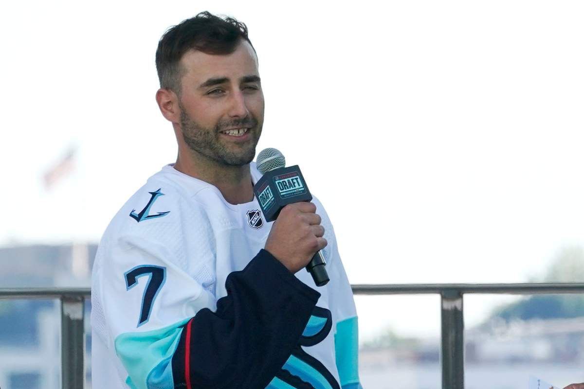 Jordan Eberle, a forward from the New York Islanders, speaks after being introduced as a new player for the Seattle Kraken, Wednesday, July 21, 2021, during the Kraken’s NHL hockey expansion draft event in Seattle.