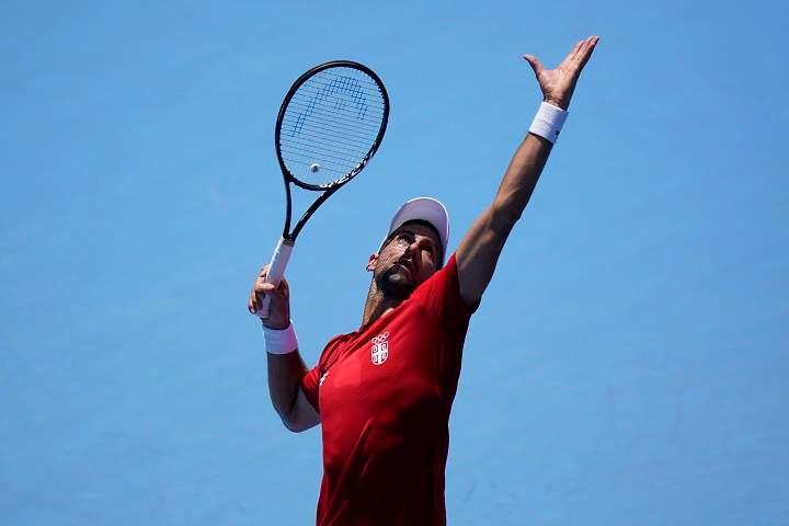 Novak Djokovic, of Serbia, practices at the Ariake Tennis Center ahead of the 2020 Summer Olympics, Friday, July 23, 2021, in Tokyo, Japan. 
