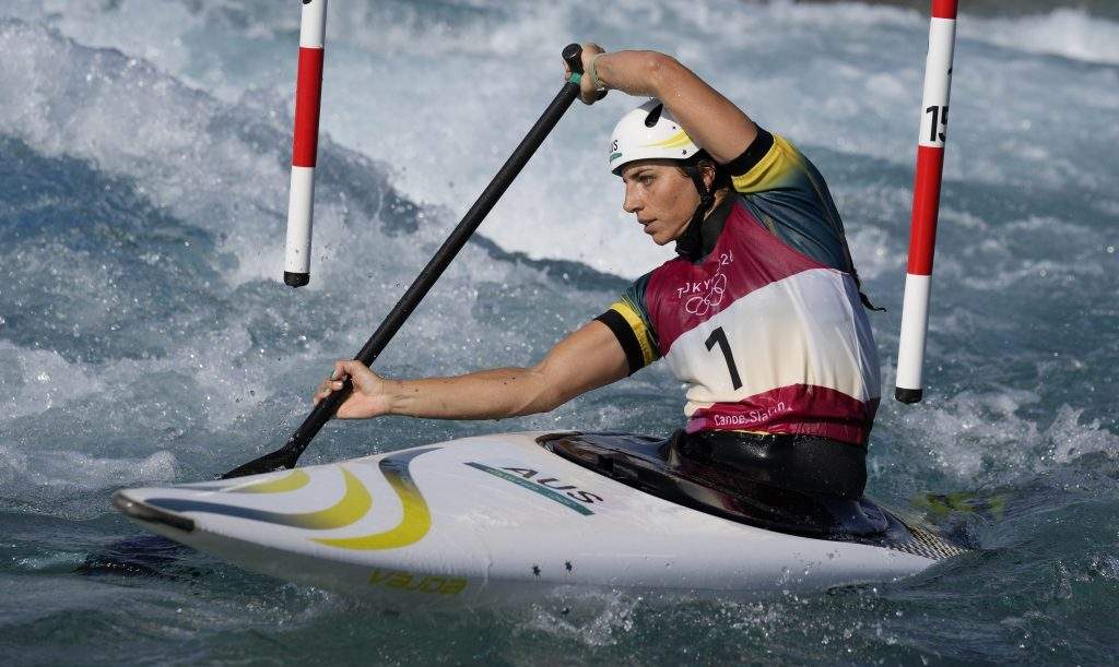 Jessica Fox of Australia competes in the Women's C1 heats of the Canoe Slalom at the 2020 Summer Olympics, Wednesday, July 28, 2021, in Tokyo, Japan. (AP Photo/Kirsty Wigglesworth).