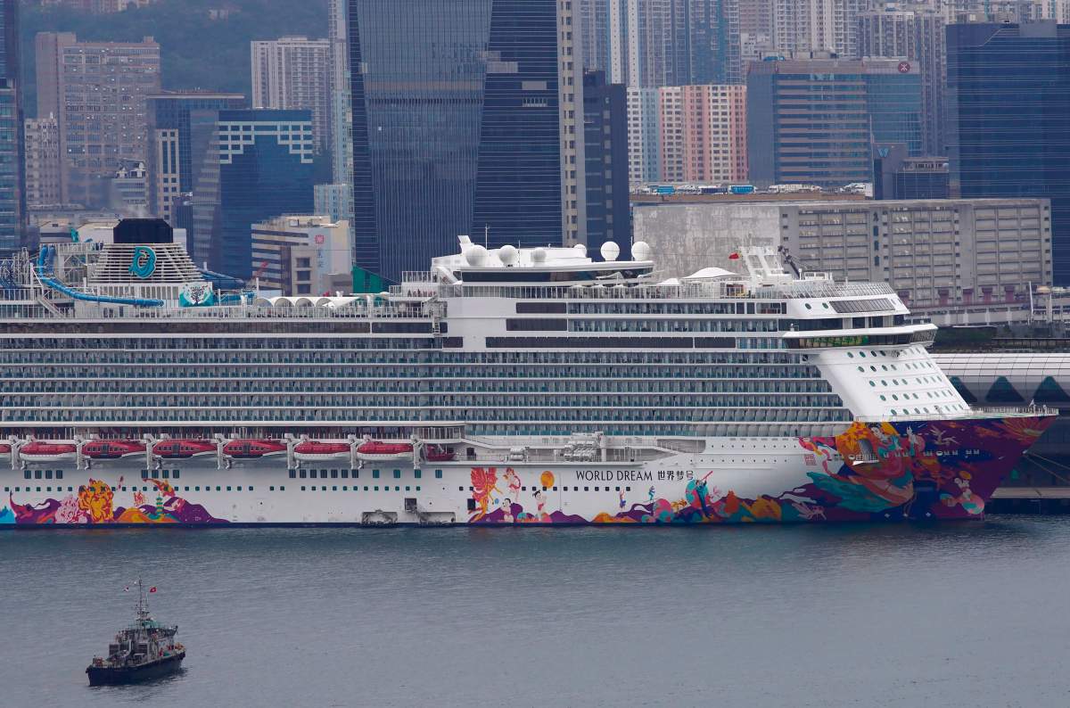 FILE -- The World Dream cruise ship docked at Kai Tak cruise terminal in Hong Kong, Wednesday, Feb. 5, 2020. (AP Photo/Vincent Yu).